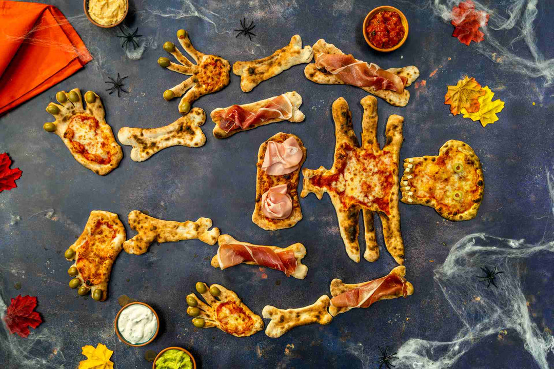 A skeleton pizza with tomato sauce and cheese