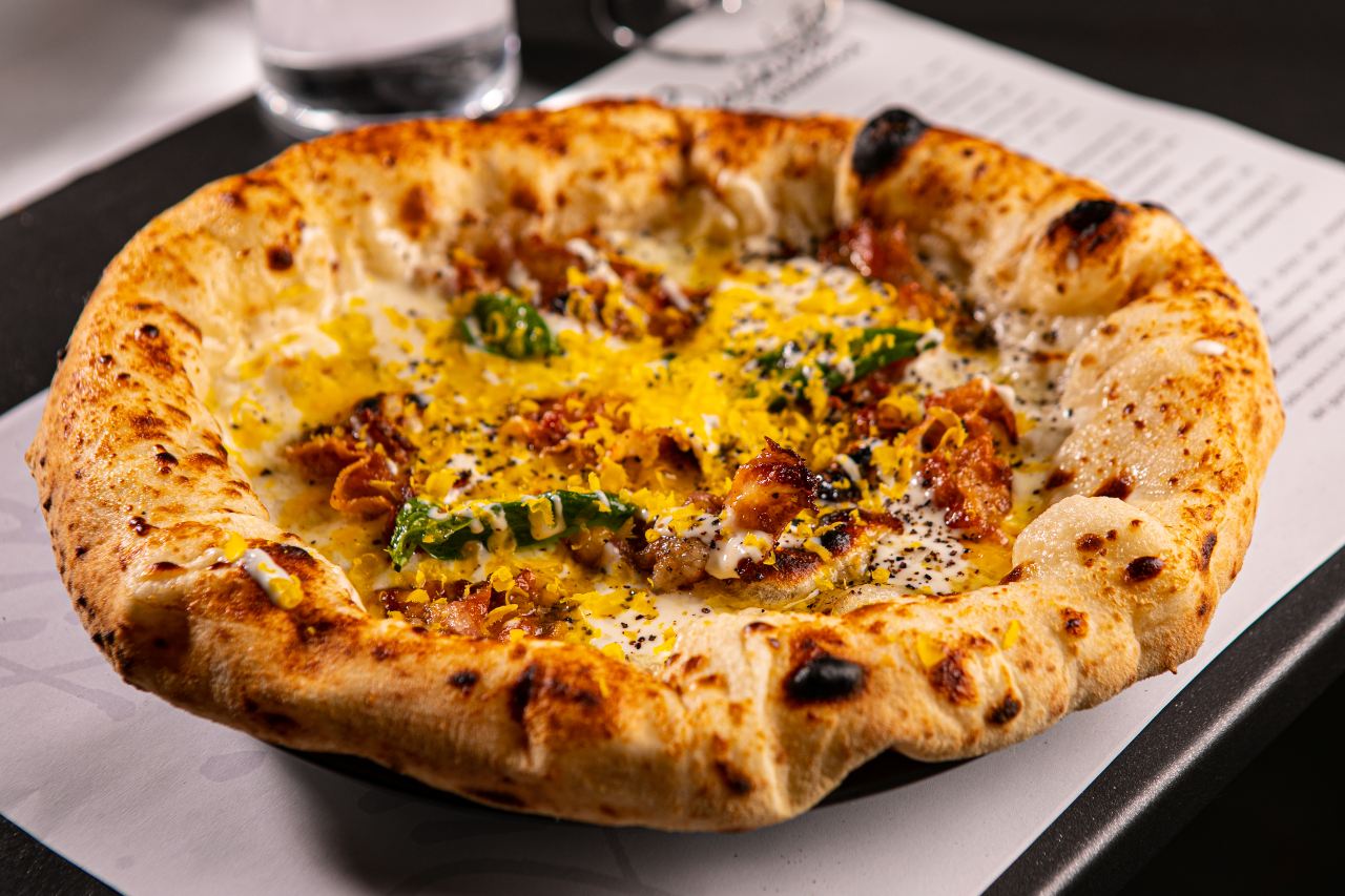 Marco Quintili’s Pizza Carbonara with Marinated Egg, Pecorino Romano Cheese and Guanciale Recipe — Ooni Australia