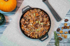 Cast Iron Pan filled with Brown Butter Stuffing With Chestnuts and Herbs