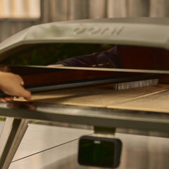 Long Pizza Oven brush cleaning the Pizza Stone of a Koda 2 Max 