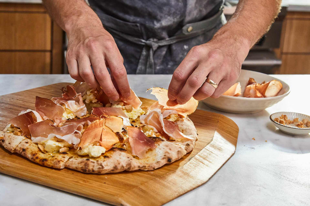 Pizza Crostini with Ricotta, Speck and Marcona Almonds