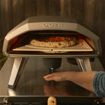 Koda 2 with rotating stone. with an arm underneath controlling he rotating stone