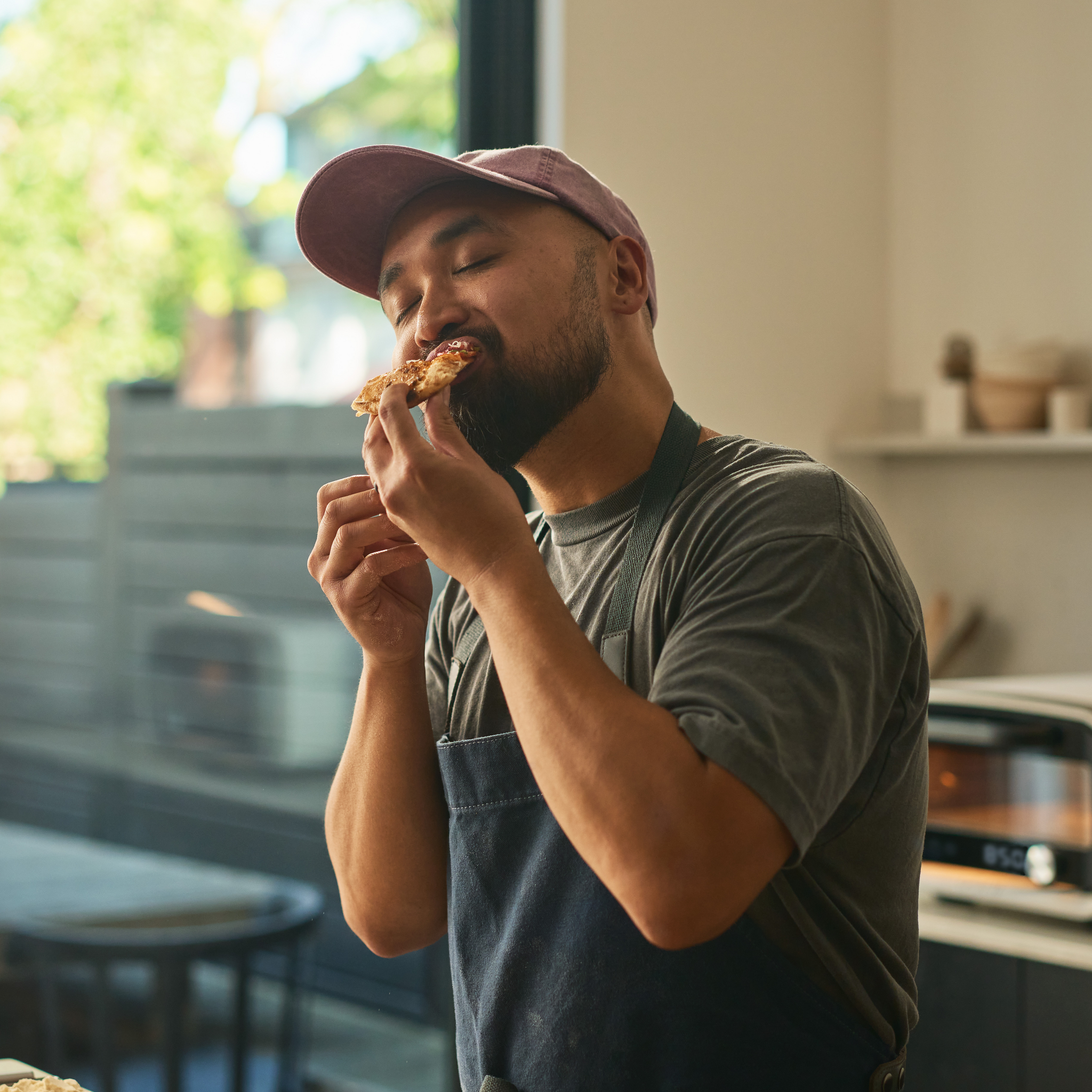 person eating pizza