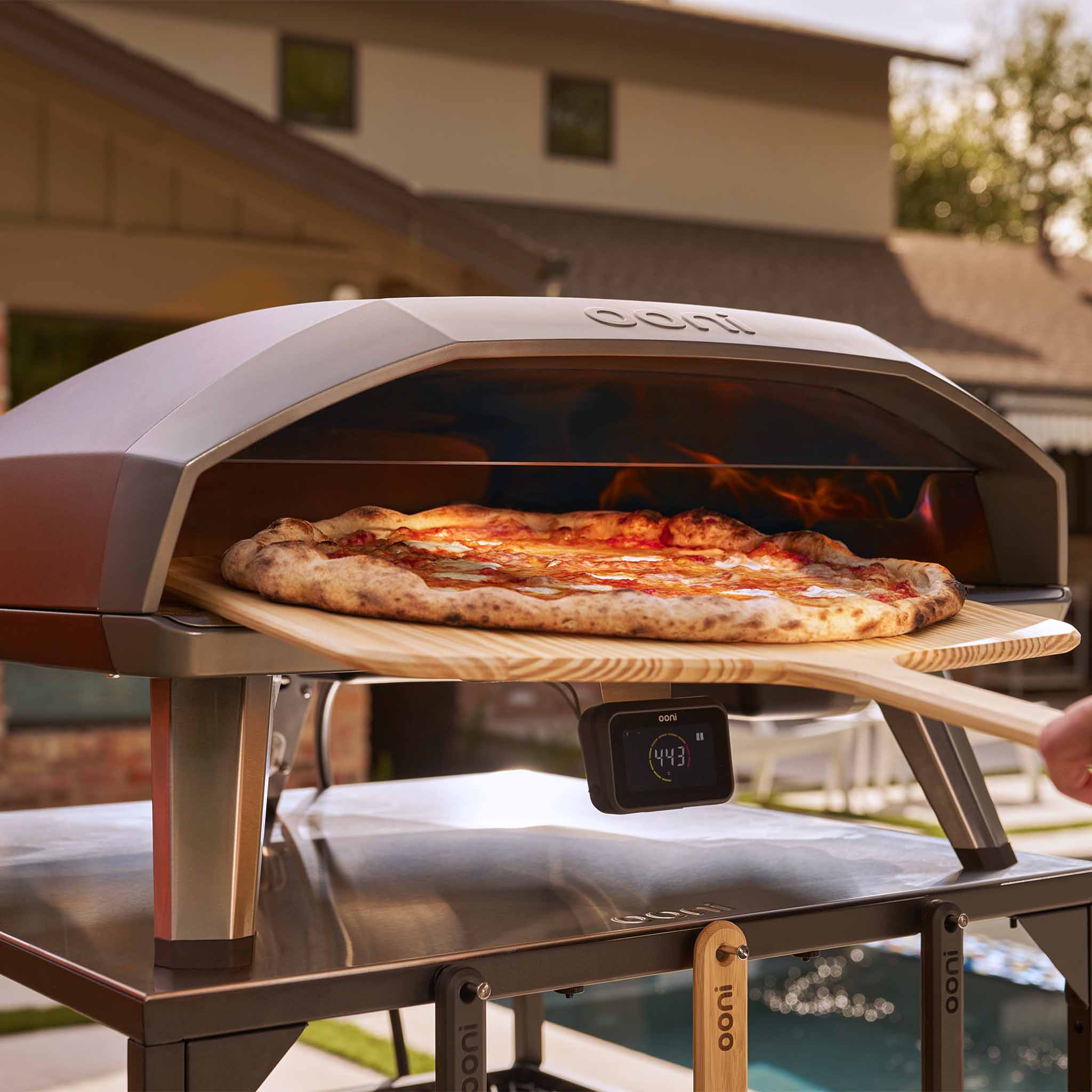 Koda 2 Max gas powered pizza oven cooking a large pizza